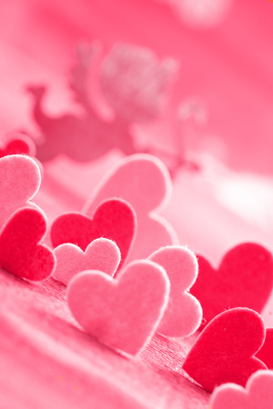 Hearts on red backgroundの写真素材