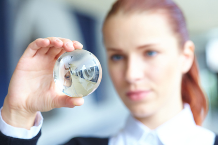 glass ball in the handの写真素材