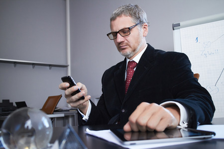 businessman with mobile phoneの写真素材
