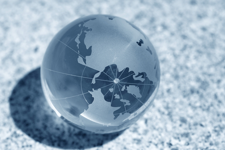glass globe on waterの写真素材