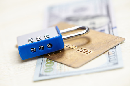 dollars with padlock