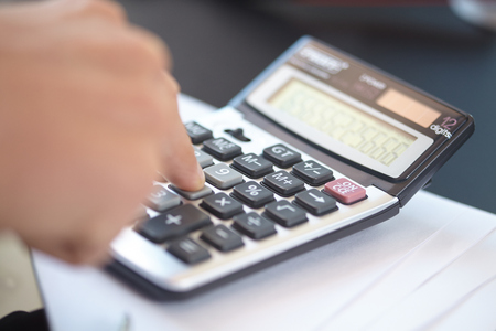businessman with calculator