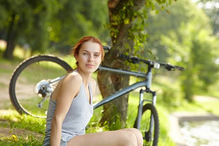 woman with bikeの写真素材