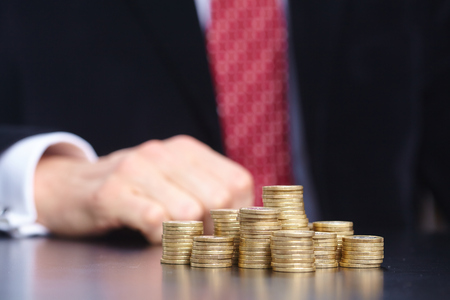 businessman with coinsの写真素材