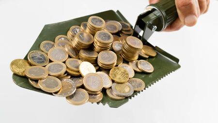 Shovel up moneyの写真素材