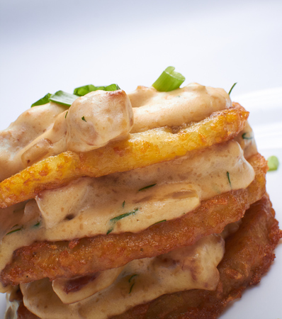 potato pancakes with sauceの写真素材