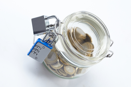 money in glass jarの写真素材