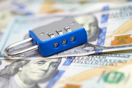 padlock on the dollarsの写真素材