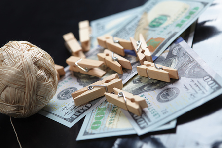 clothespins with dollars