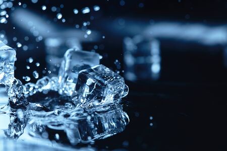 ice cubes with water splashの写真素材