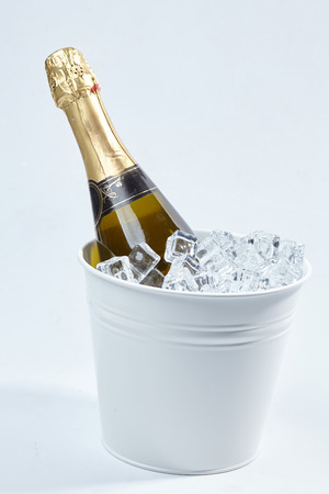 Champagne bottle in a bucketの写真素材