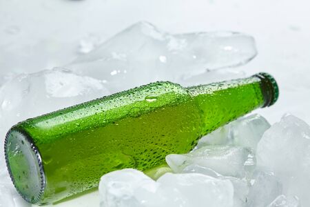 beer bottle in the iceの写真素材