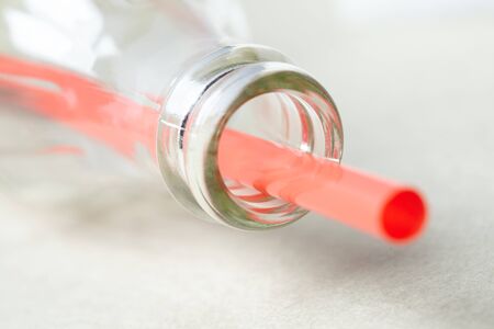 Empty soda bottle and strawの写真素材