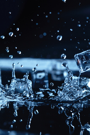 ice cubes with water splashの写真素材