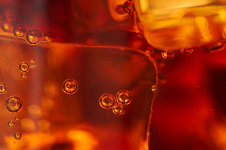 cola with ice cubes