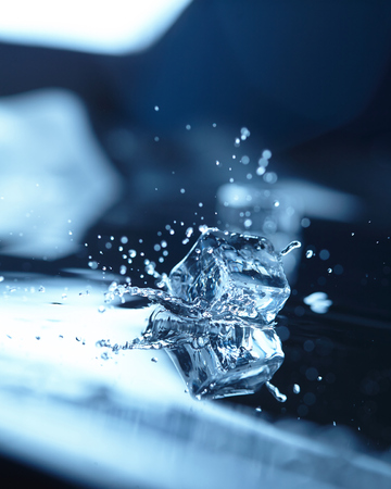 ice cubes with water splashの写真素材