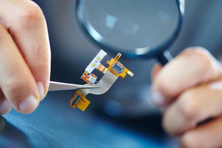microchip with tweezers