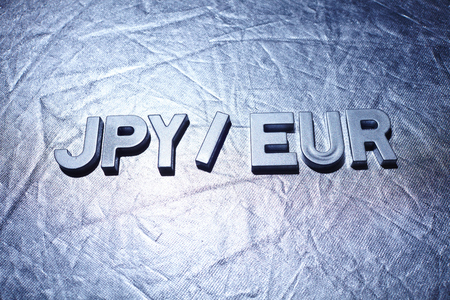 letters on silver background spelling JPY/EURの写真素材