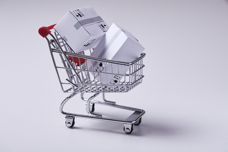shopping trolley with boxesの写真素材