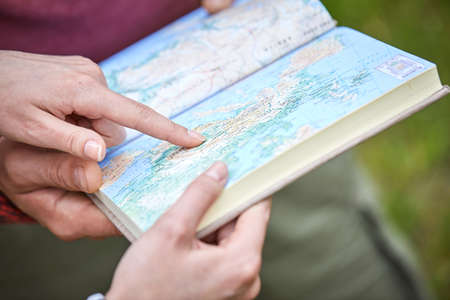 hand with a map