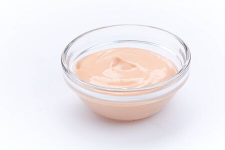 rose sauce in a bowl on white backgroundの写真素材