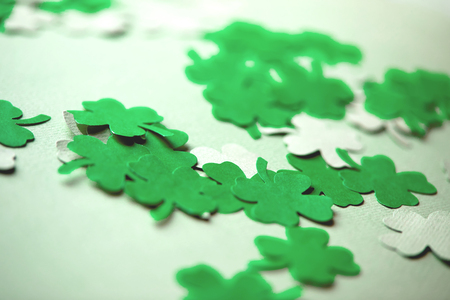 leaves of clover shape cut from paperの写真素材