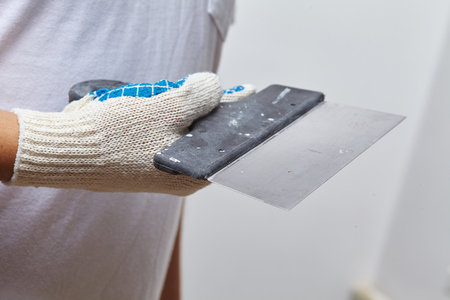 men with putty knifeの写真素材