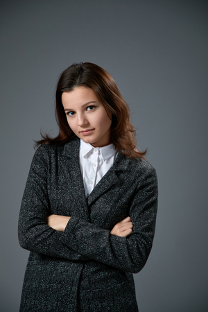 Business woman portrait . nice woman on grey backgroundの写真素材