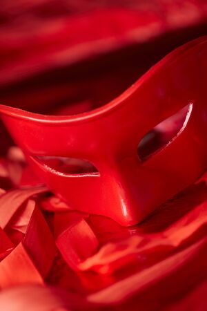 red mask on the red silkの写真素材