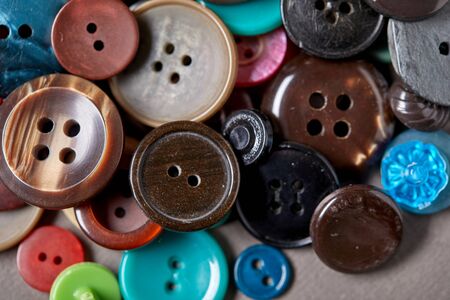 Background and texture of multicolored antique buttonsの写真素材