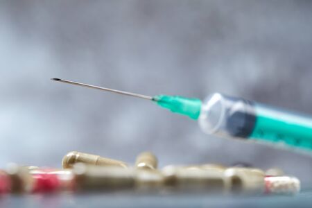 Close-up of medical syringe with drugの写真素材