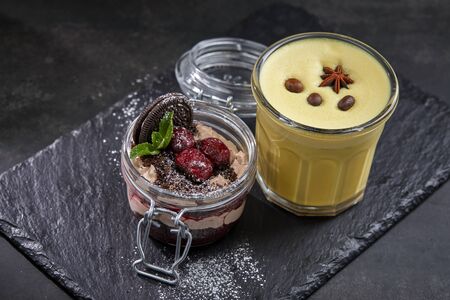 chocolate dessert and turmeric cappuccinoの写真素材