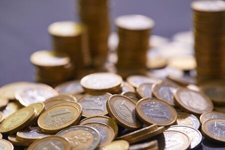 Stock Photo - Euro coins. Euro money. Euro currency.Coins stacked on each other in different...