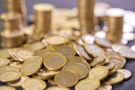 Stock Photo - Euro coins. Euro money. Euro currency.Coins stacked on each other in different...