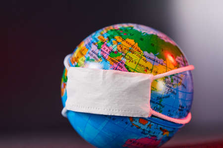 Surgical Face Mask and Globe model. Coronavirus Concept.の写真素材