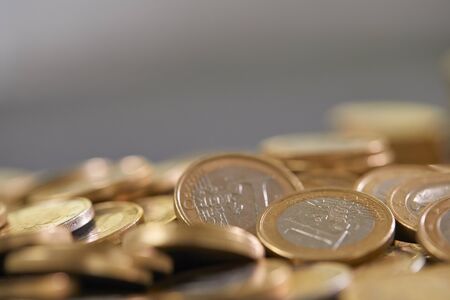 Stock Photo - Euro coins. Euro money. Euro currency.Coins stacked on each other in different...