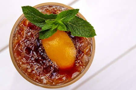 summer cocktail with fruits and mint