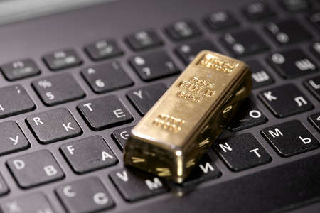 golden bar on the keyboardの写真素材