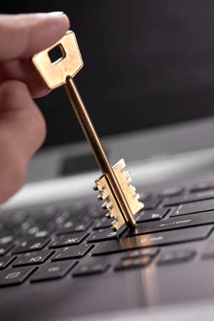 golden key in the hands