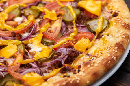 pizza on the wooden backgroundの写真素材