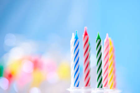 birthday candles on the blue backgroundの写真素材