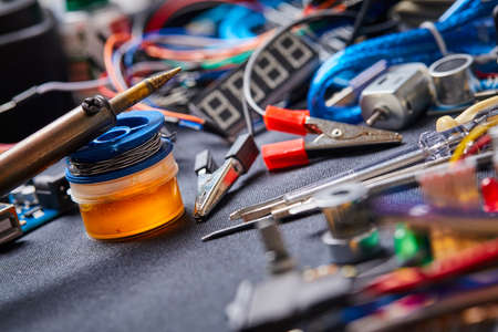 electronic board and tools repairs on black background