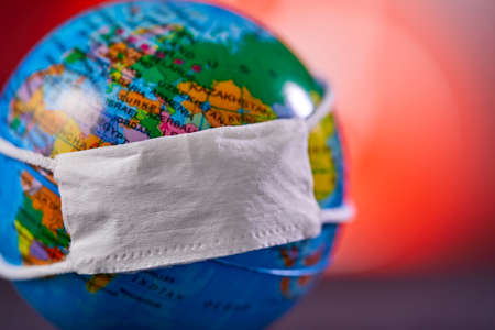 Surgical Face Mask and Globe model. Coronavirus Concept.の写真素材