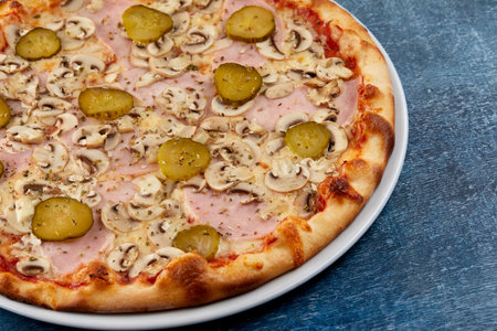 fresh pizza on the white plateの写真素材