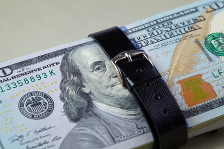 belted dollars on the tableの写真素材