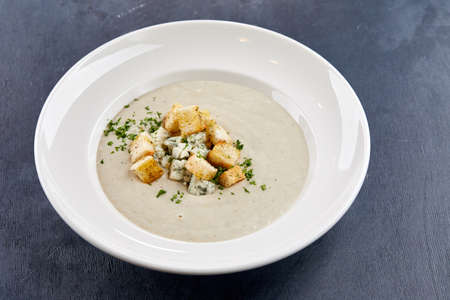 cream soup on the black backgroundの写真素材