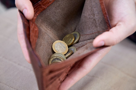 man hand putting money closeupの写真素材