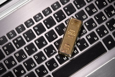 golden bar on the keyboardの写真素材