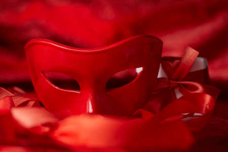 red mask and red ribbonsの写真素材