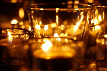 candle lights on the dark backgroundの写真素材